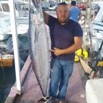 Captain Gregory Holding a wahoo
