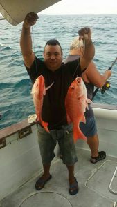 Captain Gregory Showing us some snapper